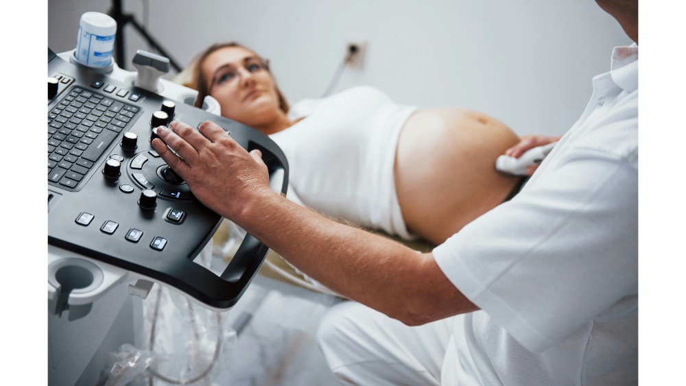 A pregnant woman undergoing a medical screening