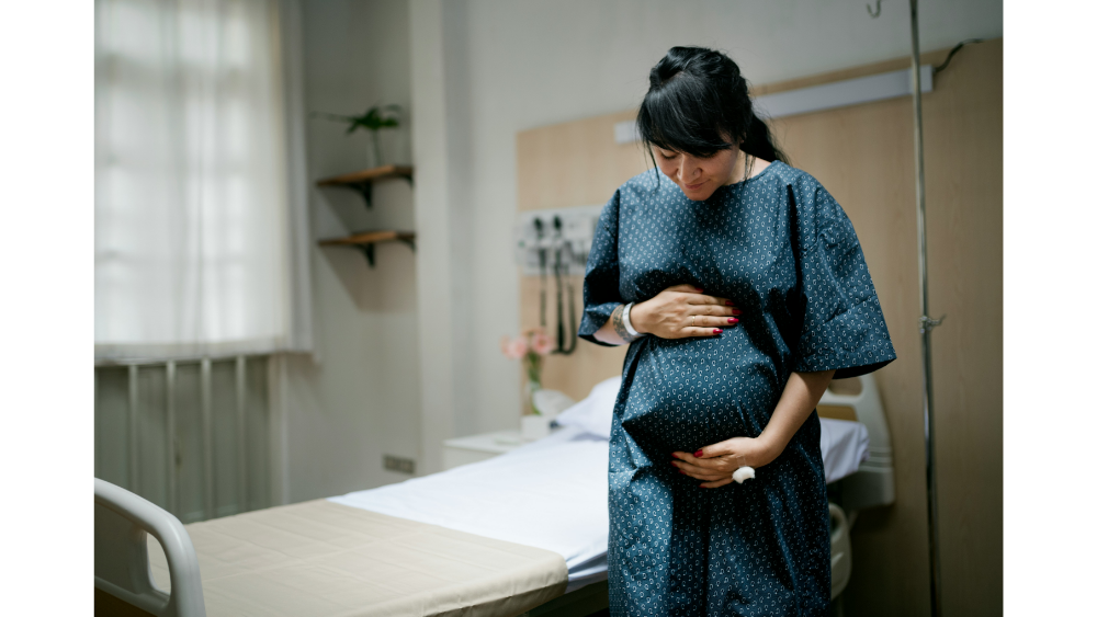 a pregnant woman in the doctors office